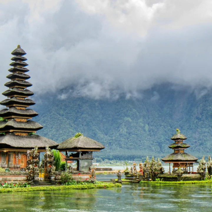 Ulun Danu Beratan Temple in Bali with mountains in the background