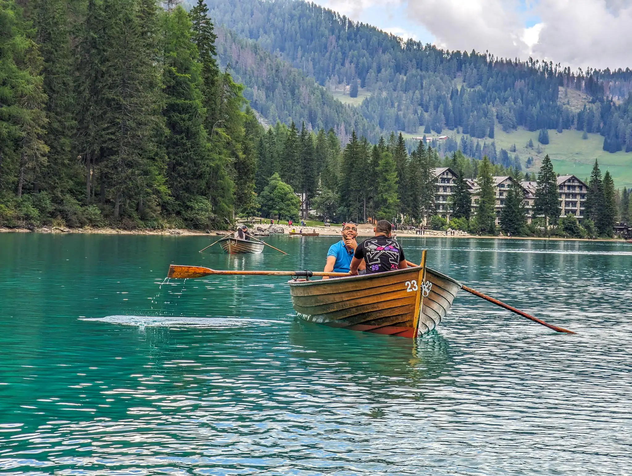 two people on a boat discussing and admiring the views