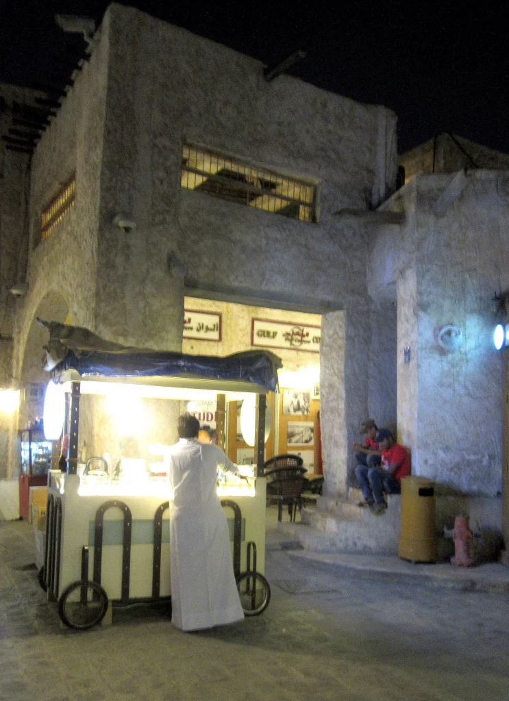 Qatar old town, night, small street, a stall selling specialities.