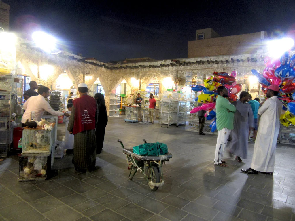Qatar old town, night, small street, people walking around the market