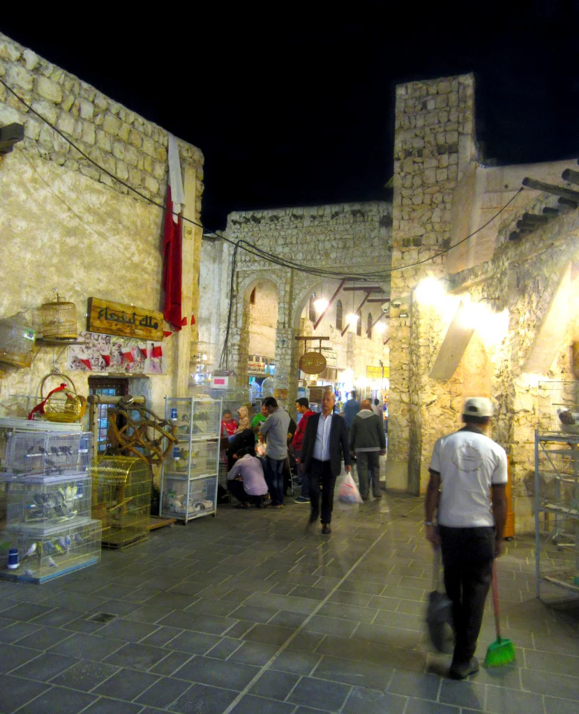 Qatar old town, night, small street, people walking around the market