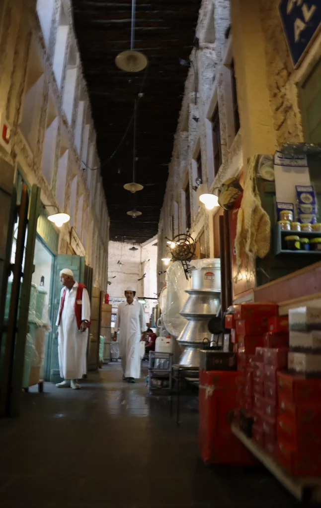 Qatar old town, night, small street, people walking around the market