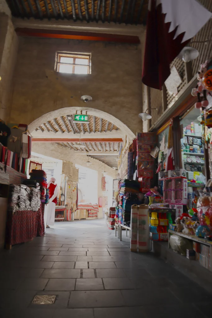 Qatar old town, day, small street, people walking around the market