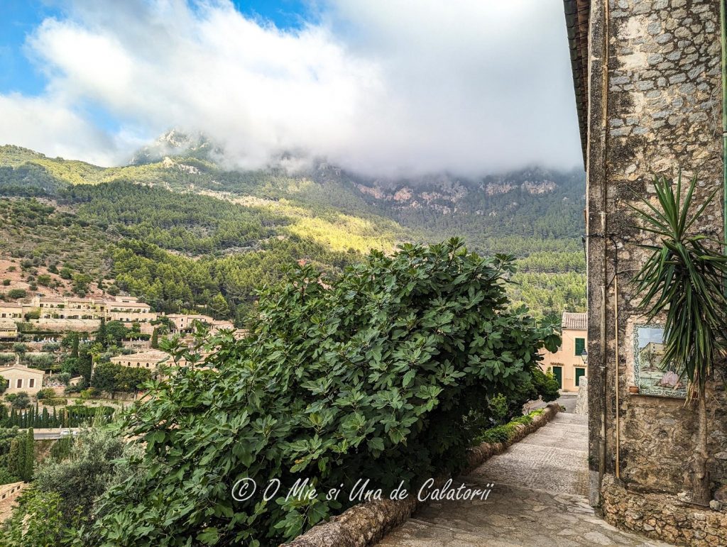 a wide shot view of the mountains covered in clods, you are unable to see the mountain tops
