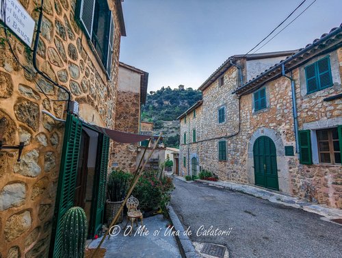 Another shot of stone houses, with all the woodwork painted in green