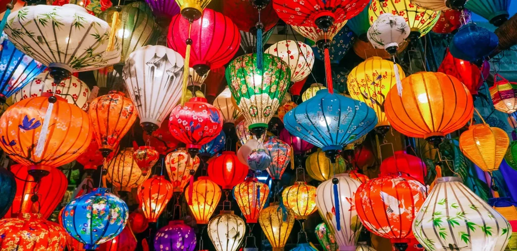 a bunch of traditional paper lanterns, all the colours, sizes and shapes!