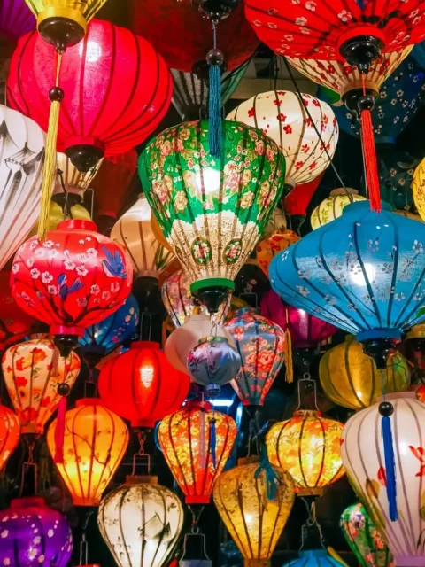 a bunch of traditional paper lanterns, all the colours, sizes and shapes!