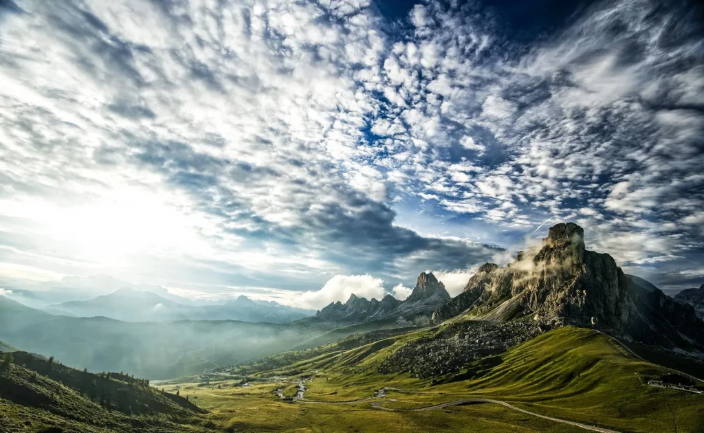 a dramatic image with mountain peaks in the Dolomites