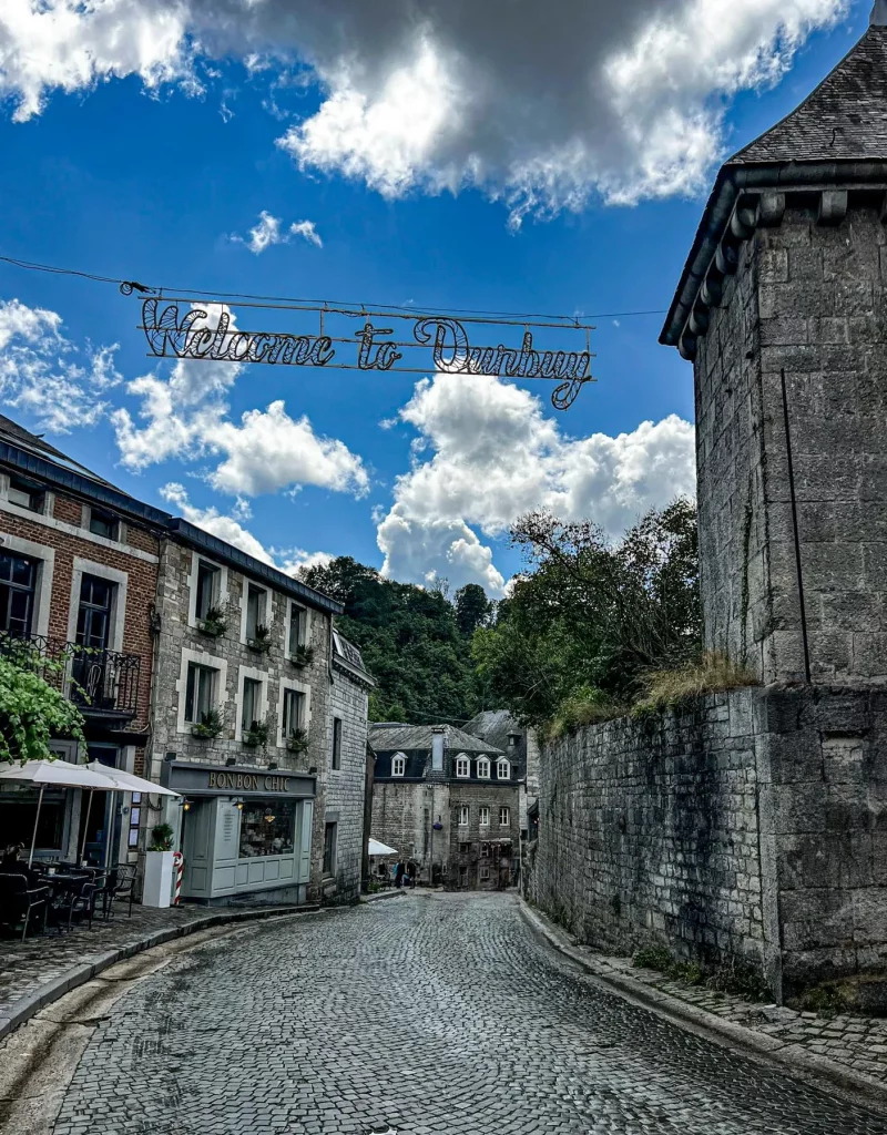Belgium Durbuy city entrance with hanging sign