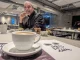 Denmark, a man enjoying breakfast and a coffee