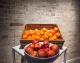 Denmark, a closeup of baskets of oranges and apples at breakfast