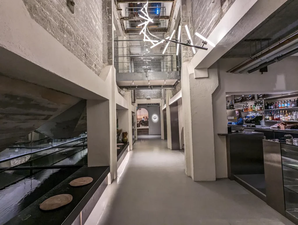 Denmark view of a hallway inside the hotel the brutalist architecture layout of the bar area