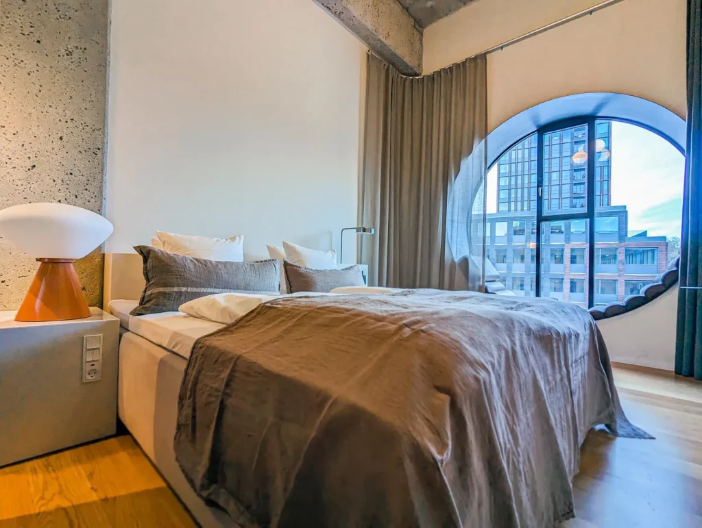 Denmark the layout of the bedroom with a double bed and a round window